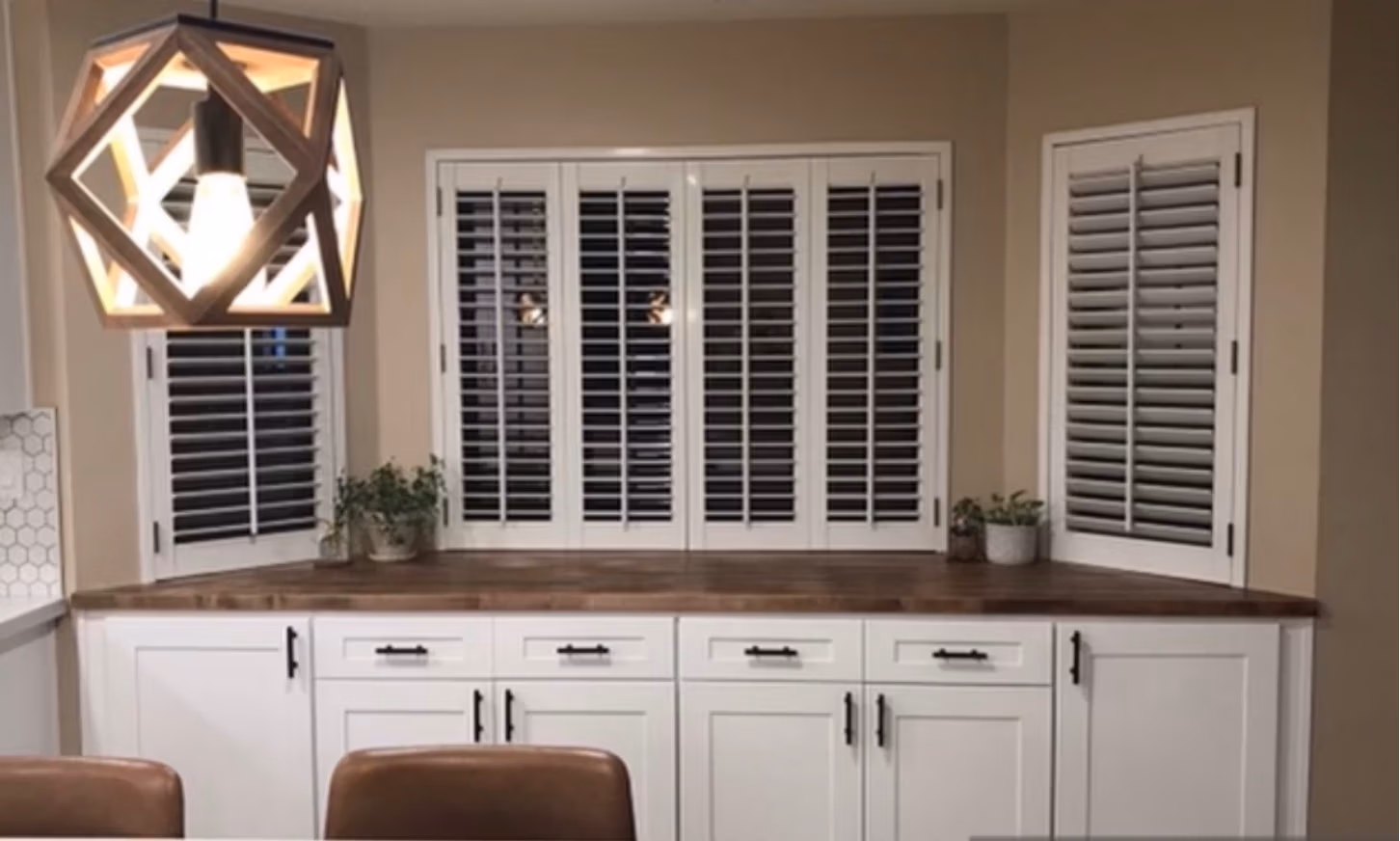 white cabinetry with wood top remodel