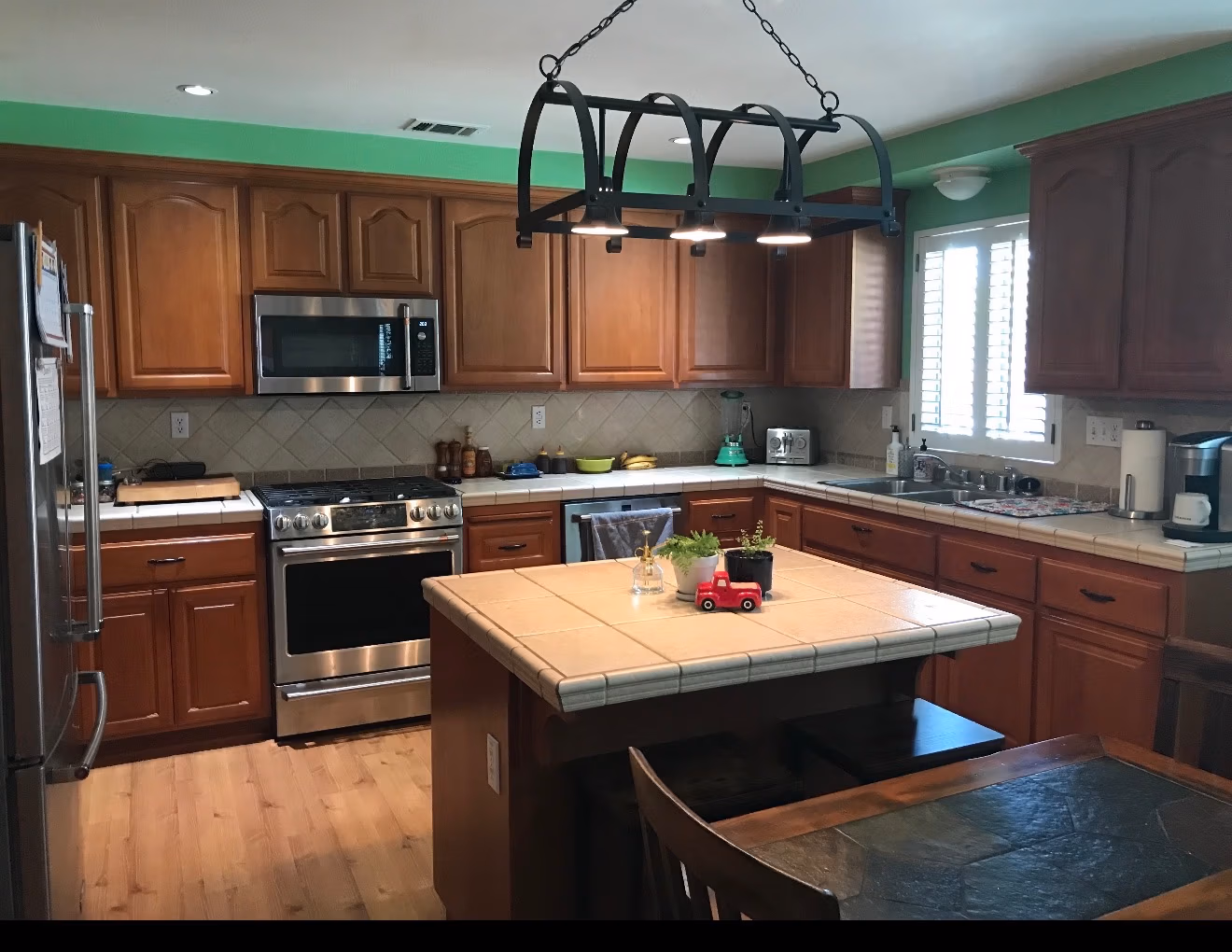 all wood brown kitchen before remodel